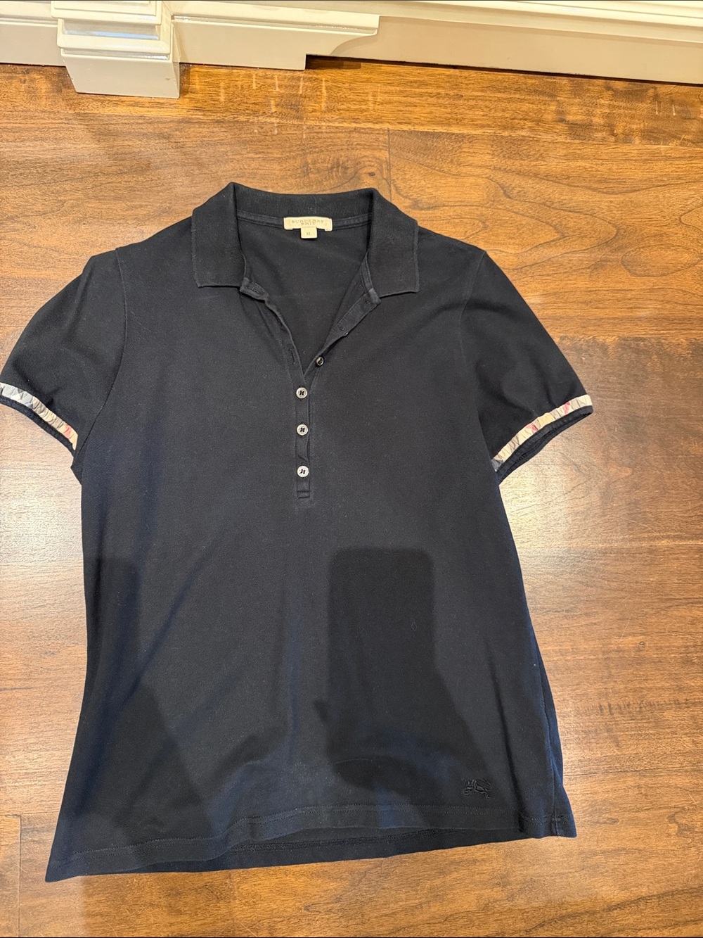 Burberry Classic Black Polo with Subtle Sleeve Trim